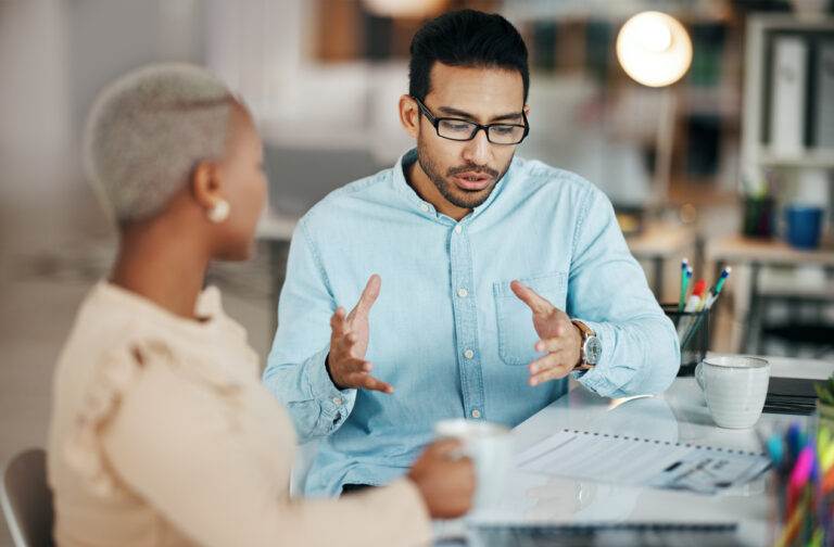 Woman discusses options with her local SEO consultant
